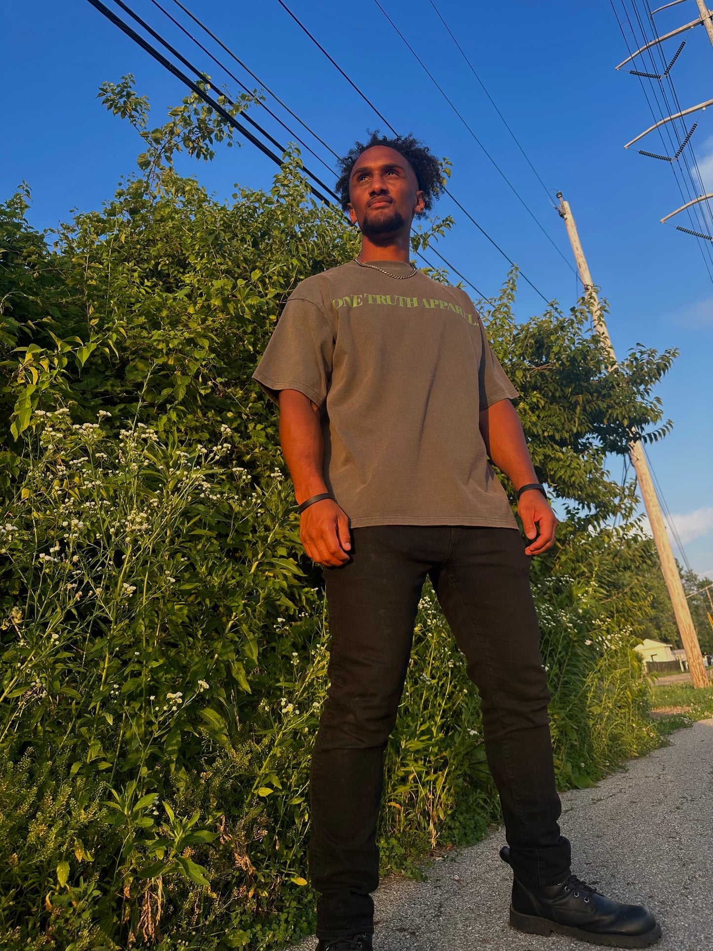 UNISEX Dark Washed Drop Shoulder Tee – "YOU NEED JESUS" (Green Lettering)