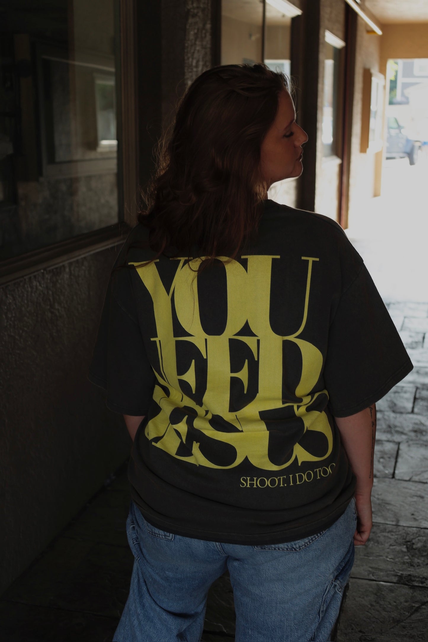 UNISEX Vintage Dark Washed Drop Shoulder Tee – "YOU NEED JESUS … shoot I do too" (Butter Yellow Lettering)